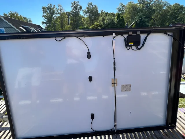Back of a Solar Full Roof™ module showing electrical cables and connectors.