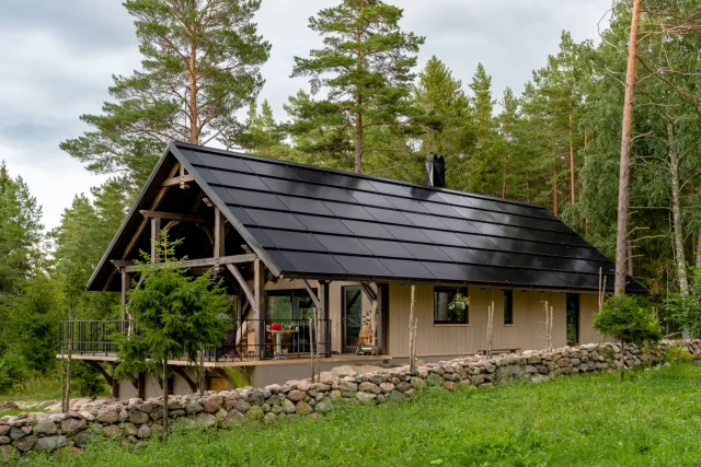 Woodland home with a full integrated solar roof in Saaremaa, Estonia.